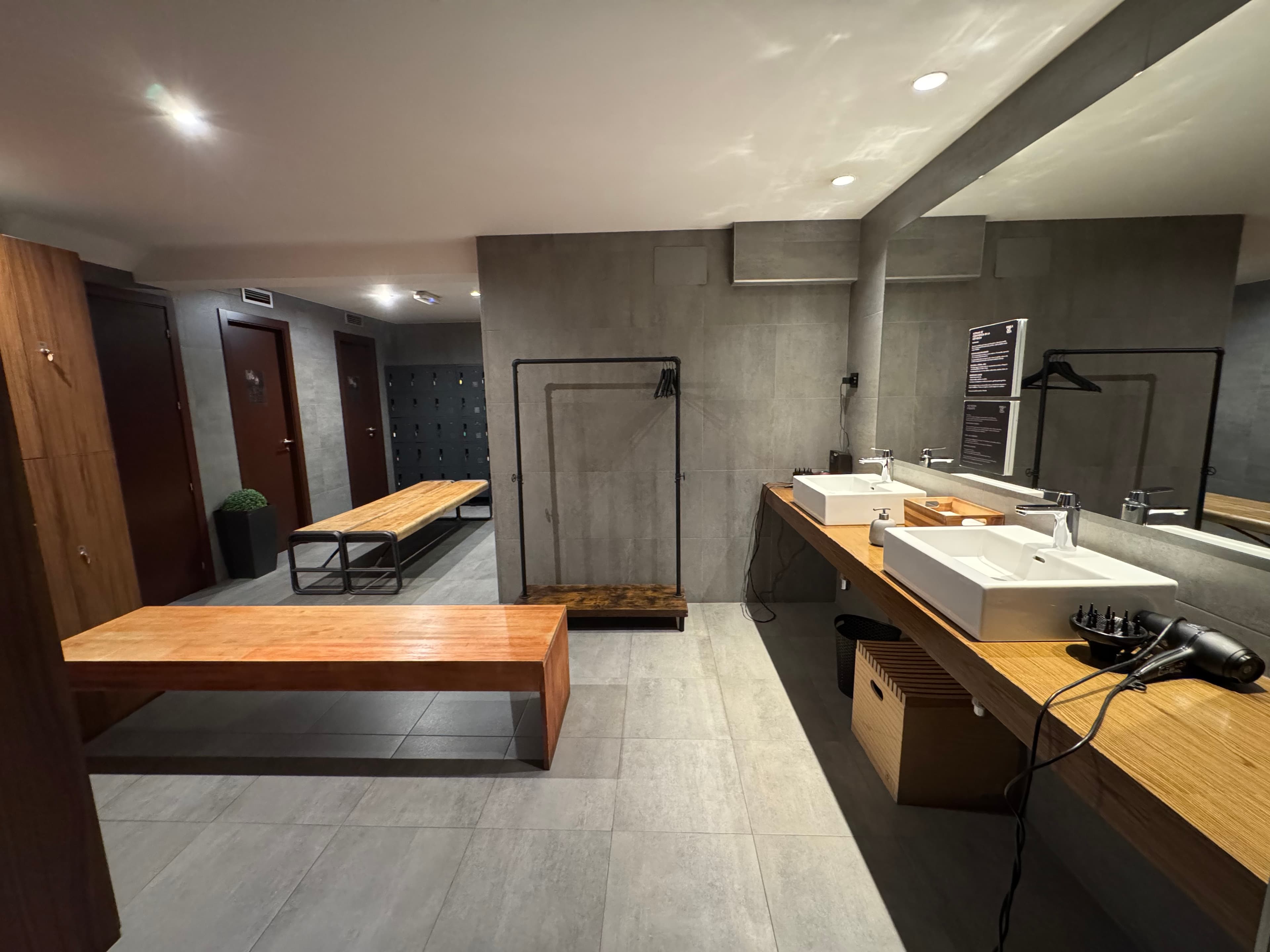 Locker room and bathrooms with showers and lockers